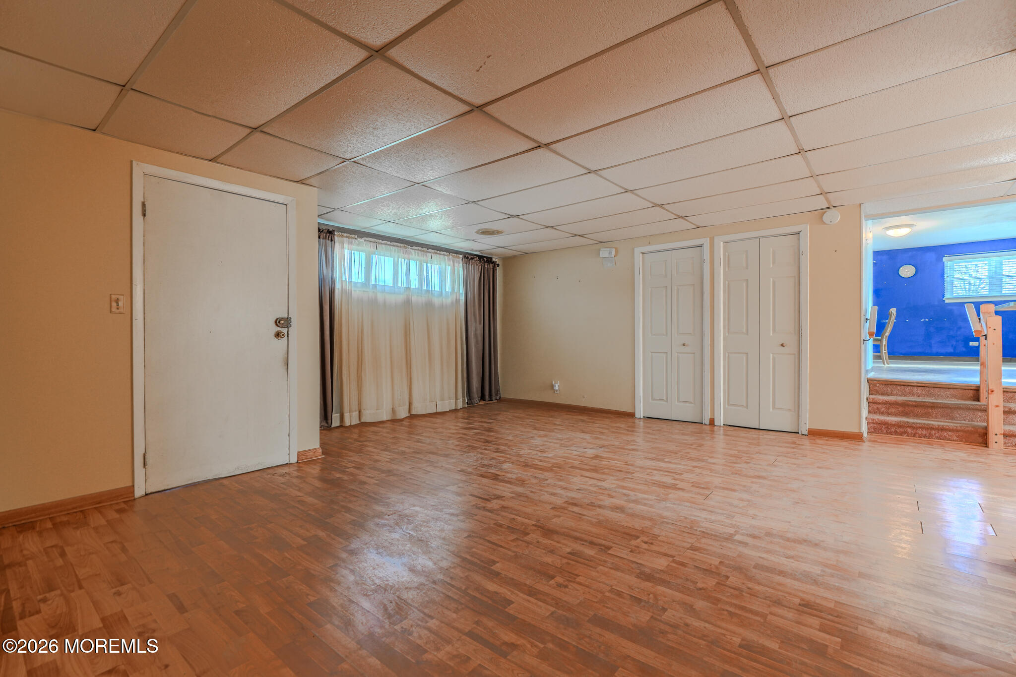 9 Hurley Street Keyport, NJ 07735 - Photo 5 of 22 a view of empty room with wooden floor and cabinet
