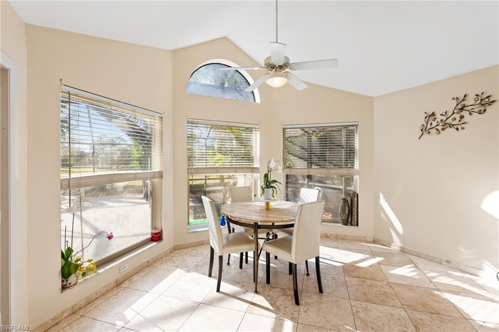 2271 Oakes Boulevard Naples, FL 34119 - Photo 17 of 47 a view of a dining room with furniture window and outside view