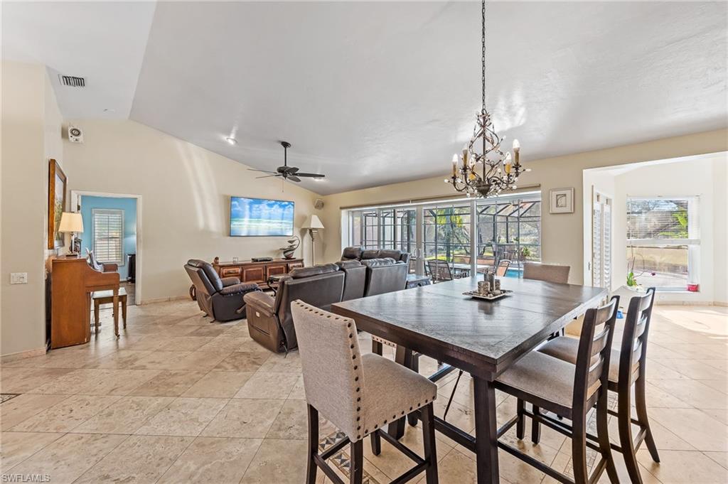2271 Oakes Boulevard Naples, FL 34119 - Photo 10 of 47 a view of a dining room with furniture window and outside view