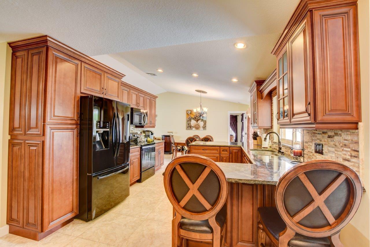 9726 Ohio Place Boca Raton, FL 33434 - Photo 13 of 29 Kitchen from Family Room