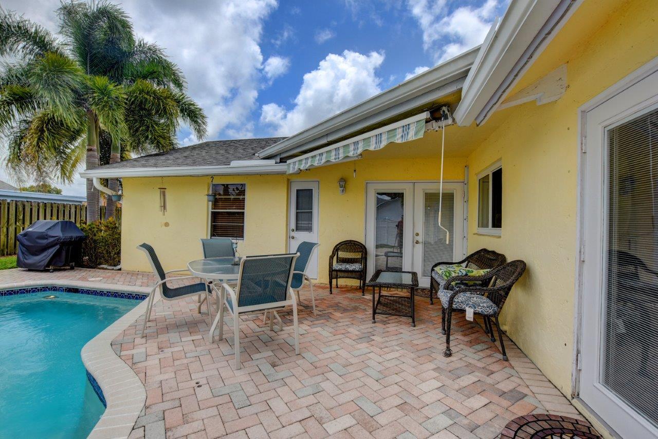 9726 Ohio Place Boca Raton, FL 33434 - Photo 27 of 29 Patio with rollout awning