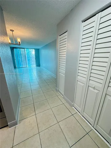a bathroom with a sink and a stove top oven