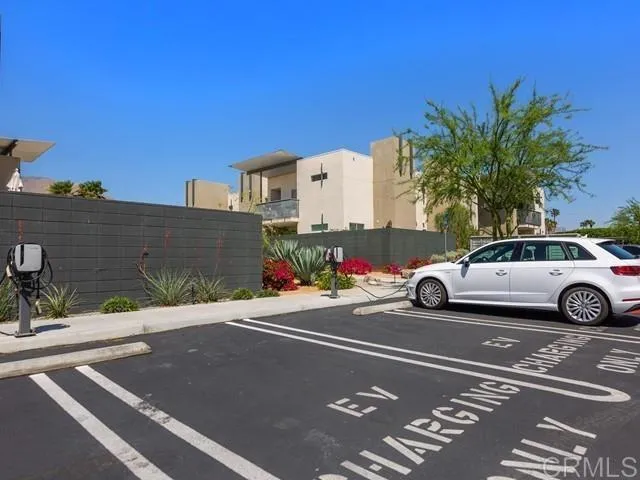 a view of street with parked cars
