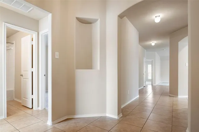 a kitchen with stainless steel appliances granite countertop a sink and a stove