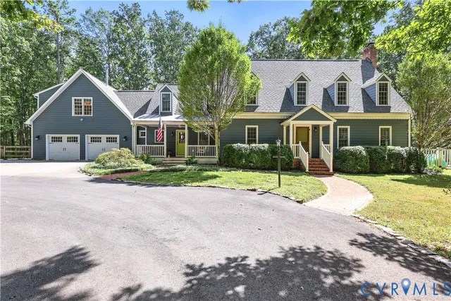 front view of a house next to a yard
