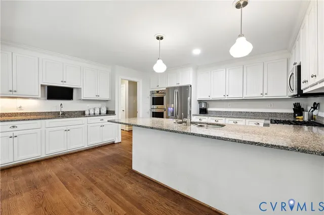a large kitchen with cabinets