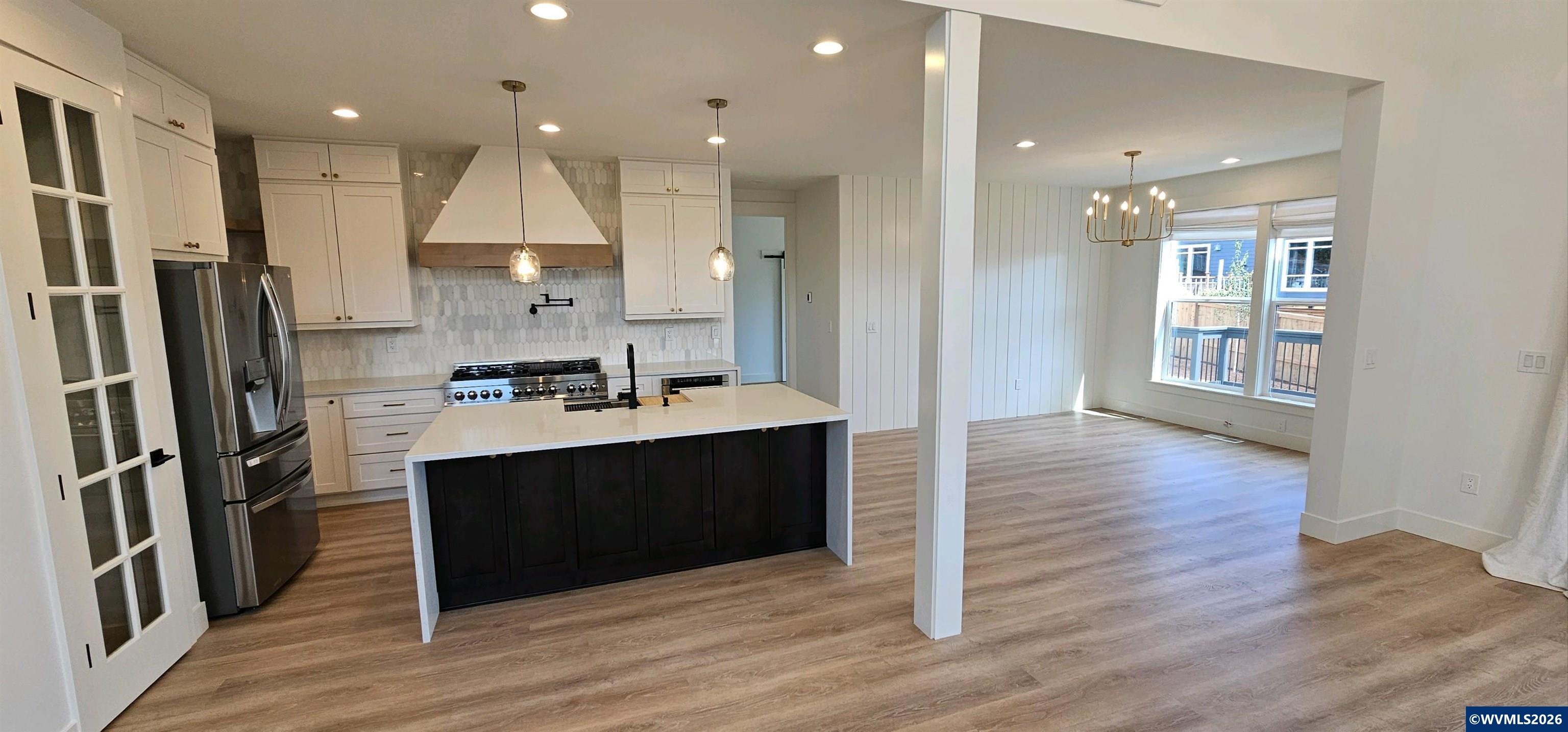 Model B Salishan Street Southeast Salem, OR 97302 - Photo 3 of 30 a kitchen with stainless steel appliances granite countertop a refrigerator and a sink