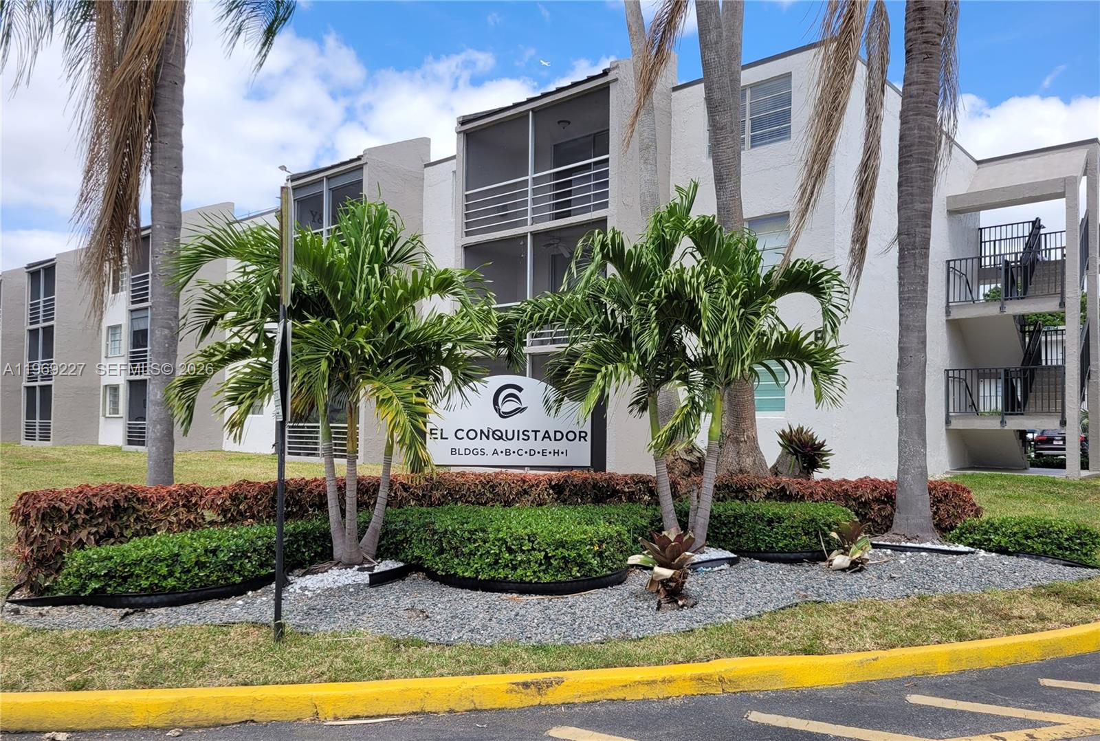 14140 Southwest 84th Street, Unit 301H Miami, FL 33183 - Photo 1 of 39 a front view of a house with swimming pool and porch