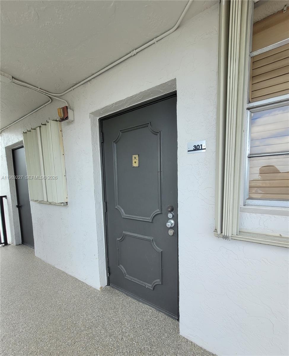 14140 Southwest 84th Street, Unit 301H Miami, FL 33183 - Photo 13 of 39 a view of empty room