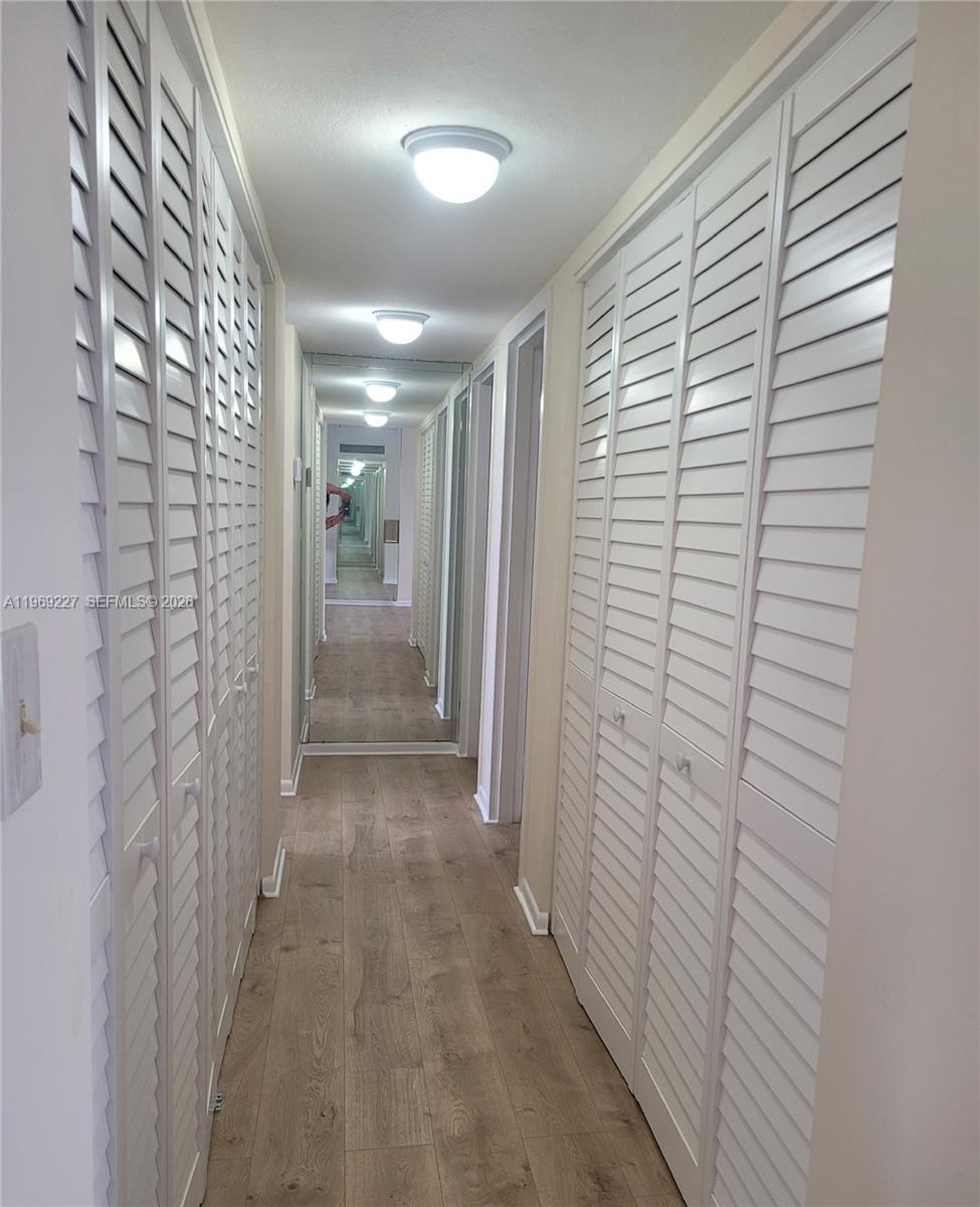 14140 Southwest 84th Street, Unit 301H Miami, FL 33183 - Photo 22 of 39 a view of hallway with shower