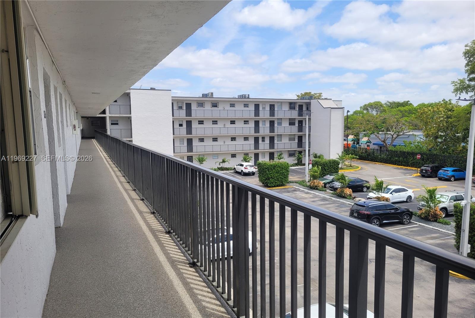 14140 Southwest 84th Street, Unit 301H Miami, FL 33183 - Photo 6 of 39 a view of city from a balcony