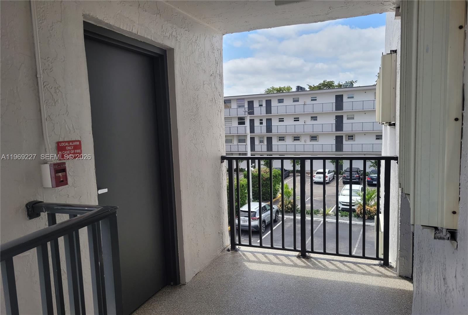 14140 Southwest 84th Street, Unit 301H Miami, FL 33183 - Photo 7 of 39 a view of a balcony with city view