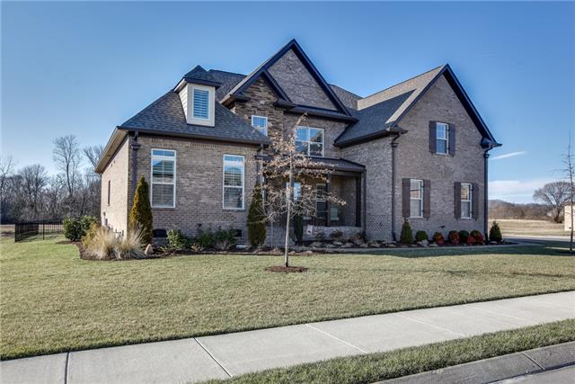 2063 Autumn Ridge Way Spring Hill, TN 37174 - Photo 19 of 20 2063 Autumn Ridge Way is set on a corner lot and is a truly special home with plantation shutters throughout, lovely indoor and outdoor living spaces, a fully sodded yard with full irrigation, and a 3-car side entry garage.
