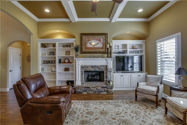2063 Autumn Ridge Way Spring Hill, TN 37174 - Photo 6 of 20 Another view of the living room showcases the fireplace and built-ins.