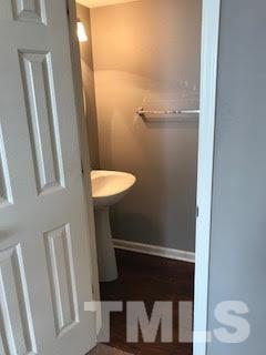 2444 Pumpkin Ridge Way Raleigh, NC 27604 - Photo 5 of 15 a bathroom with a toilet and a sink