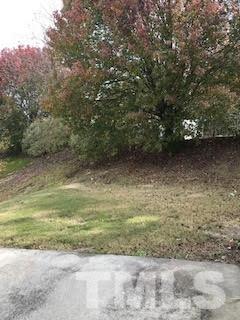 2444 Pumpkin Ridge Way Raleigh, NC 27604 - Photo 6 of 15 a view of a yard with a tree