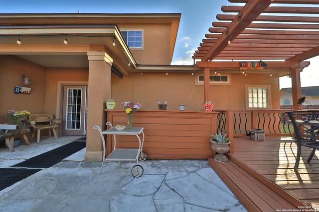 a view of a hallway with seating area