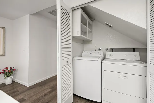 a utility room with dryer and washer