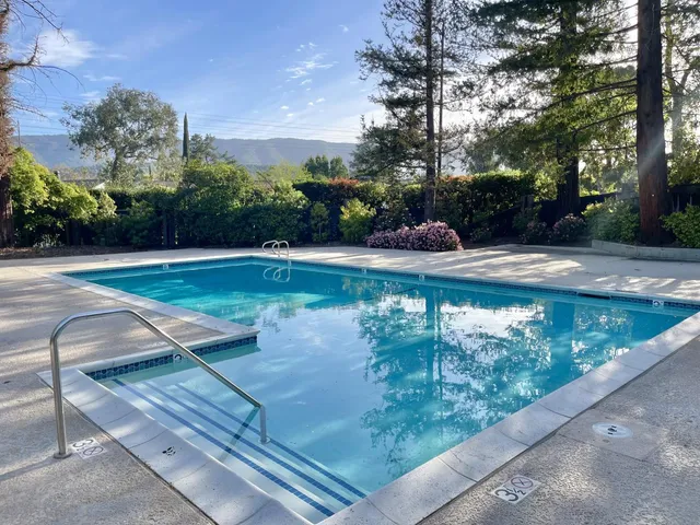 a view of a backyard with a house
