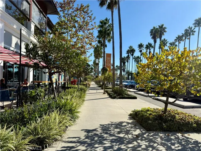 a view of a cafe with sitting area
