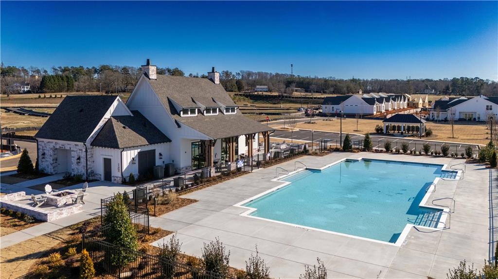 579 Pearl Street Cumming, GA 30040 - Photo 26 of 30 an aerial view of a house with a garden