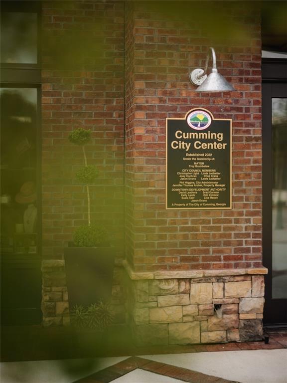 579 Pearl Street Cumming, GA 30040 - Photo 28 of 30 a view of a brick wall