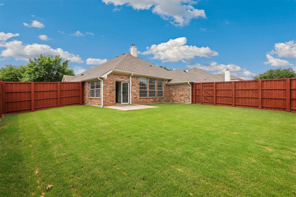 9914 Golden Rod Drive Frisco, TX 75035 - Photo 14 of 18 a view of a house with a yard and sitting area