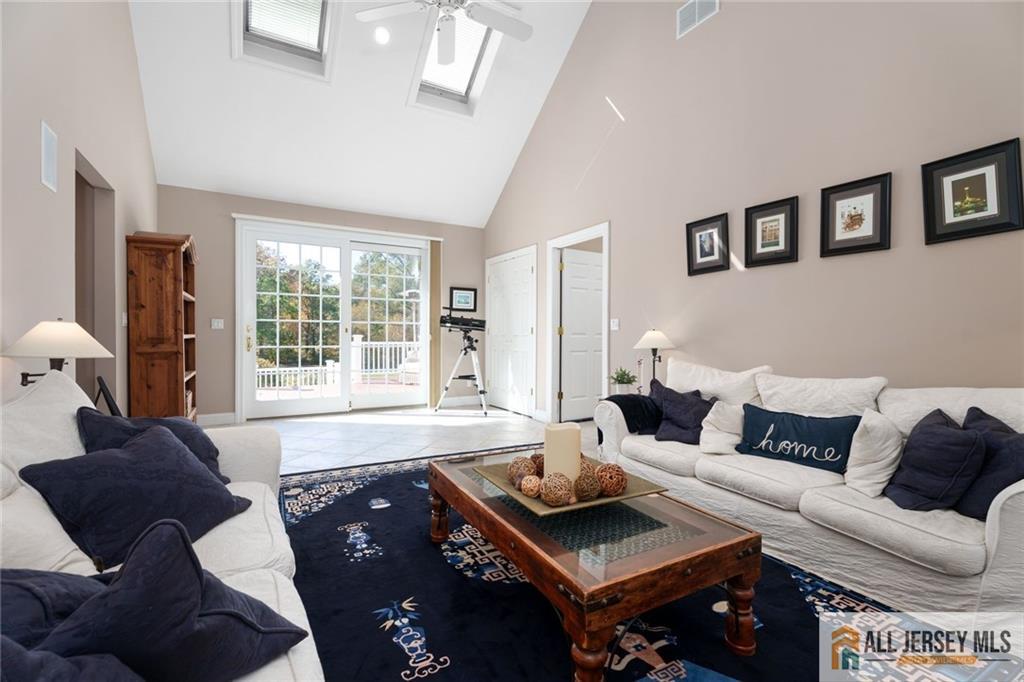 213 Cranbury Neck Road Plainsboro, NJ 08512 - Photo 14 of 52 a living room with furniture rug and window