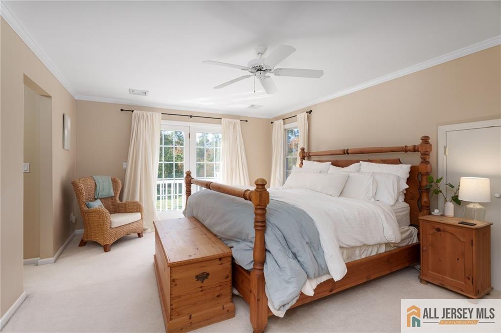 213 Cranbury Neck Road Plainsboro, NJ 08512 - Photo 17 of 52 a bed room with a bed and a couch