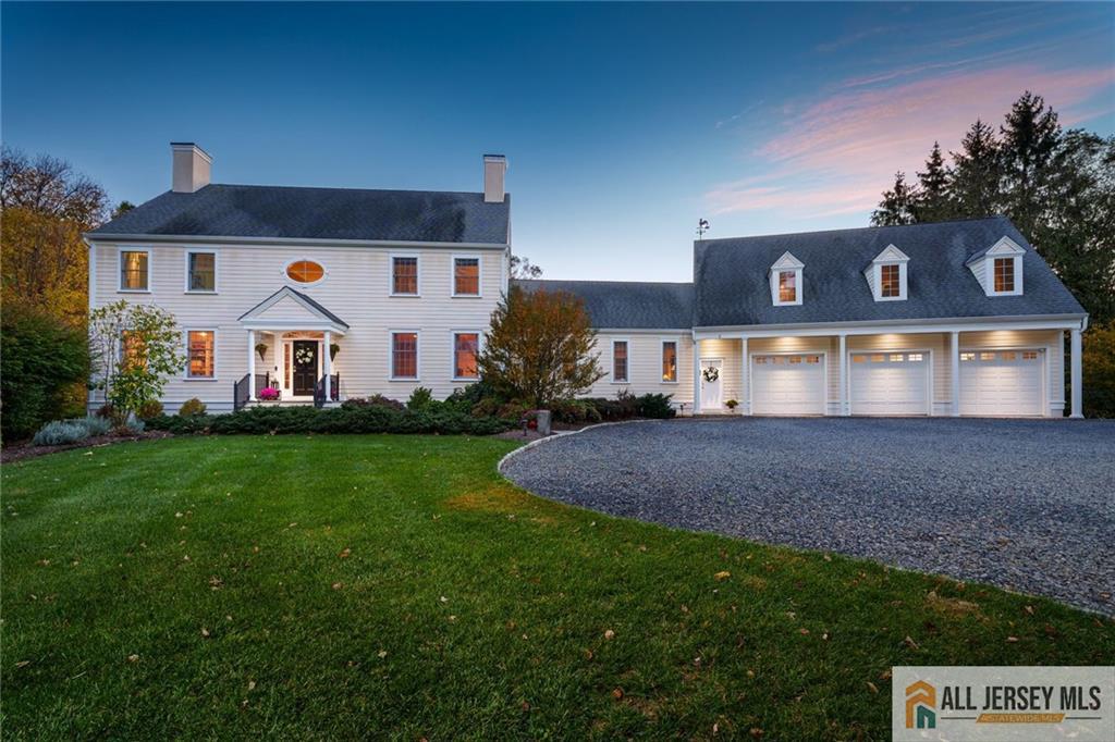 213 Cranbury Neck Road Plainsboro, NJ 08512 - Photo 2 of 52 a front view of a house with a yard