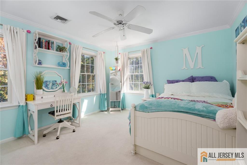 213 Cranbury Neck Road Plainsboro, NJ 08512 - Photo 21 of 52 a living room with furniture and a table