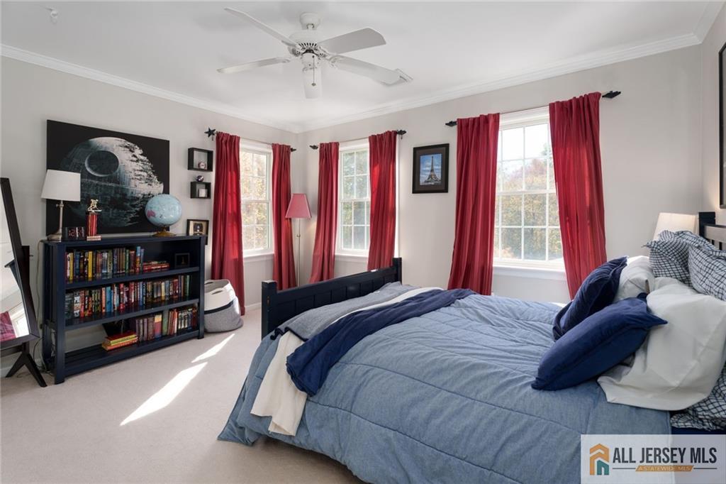 213 Cranbury Neck Road Plainsboro, NJ 08512 - Photo 23 of 52 a bedroom with a large bed and a window