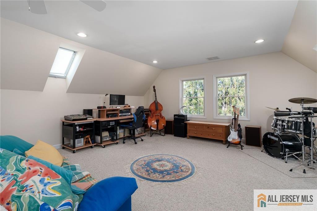 213 Cranbury Neck Road Plainsboro, NJ 08512 - Photo 24 of 52 a living room with furniture and a wooden floor
