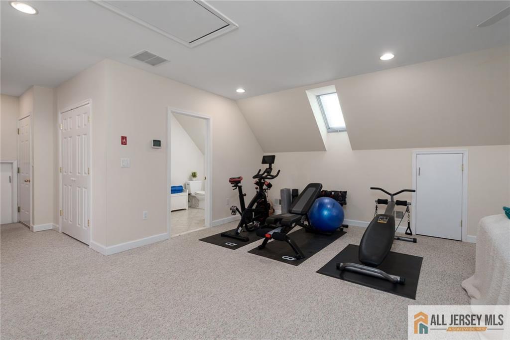 213 Cranbury Neck Road Plainsboro, NJ 08512 - Photo 25 of 52 a room with gym equipment