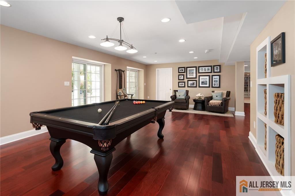 213 Cranbury Neck Road Plainsboro, NJ 08512 - Photo 26 of 52 a room with furniture pool table flat screen tv and windows