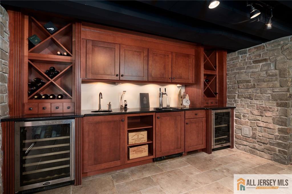 213 Cranbury Neck Road Plainsboro, NJ 08512 - Photo 30 of 52 a kitchen with granite countertop a stove and cabinets