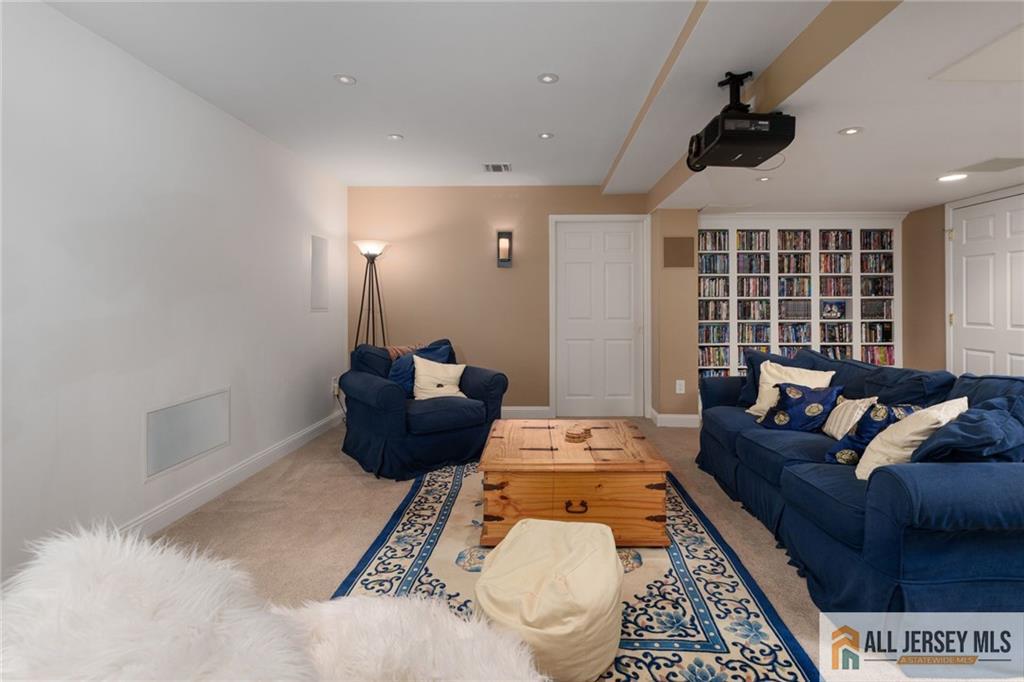 213 Cranbury Neck Road Plainsboro, NJ 08512 - Photo 33 of 52 a living room with furniture and a large window