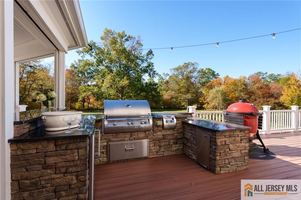 213 Cranbury Neck Road Plainsboro, NJ 08512 - Photo 35 of 52 a view of a chairs and table on the wooden floor