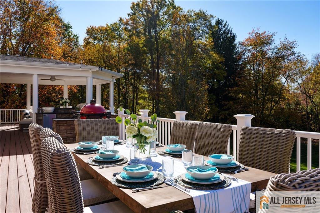 213 Cranbury Neck Road Plainsboro, NJ 08512 - Photo 37 of 52 a outdoor dining space with furniture and potted plants