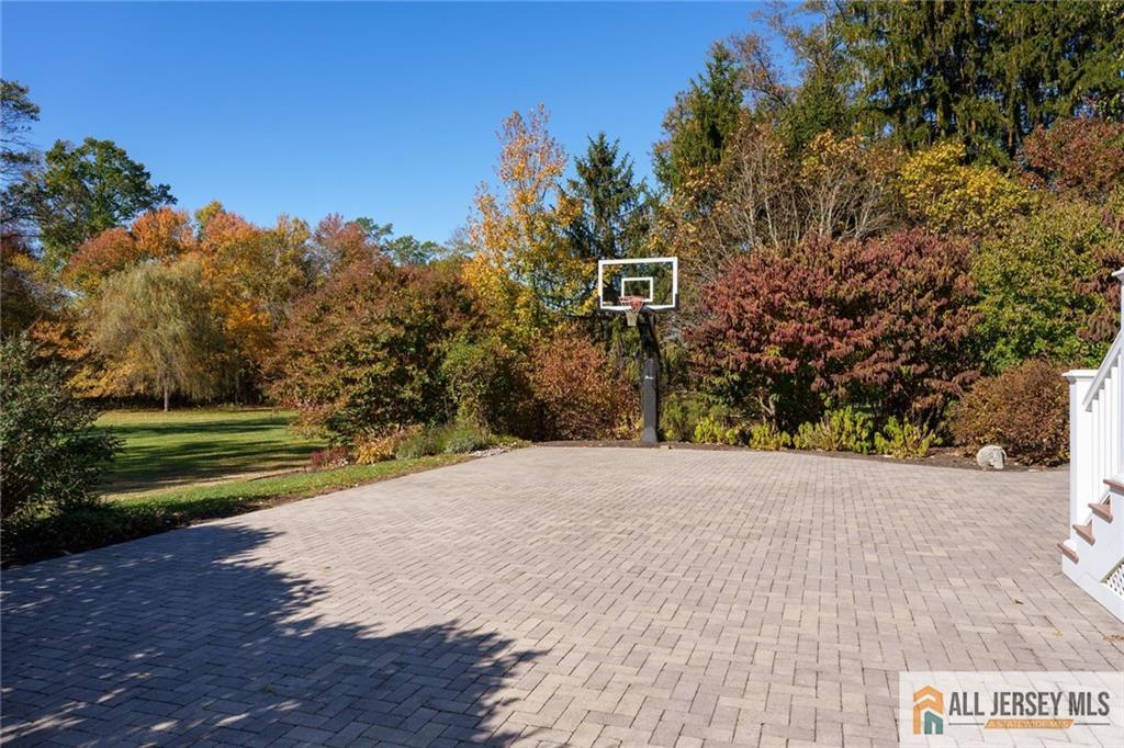 213 Cranbury Neck Road Plainsboro, NJ 08512 - Photo 38 of 52 a front view of a house with a yard