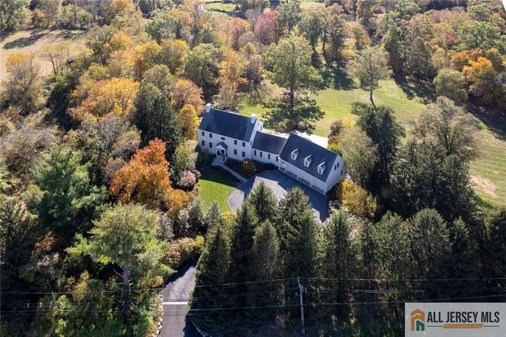 213 Cranbury Neck Road Plainsboro, NJ 08512 - Photo 44 of 52 a view of a city with lush green forest