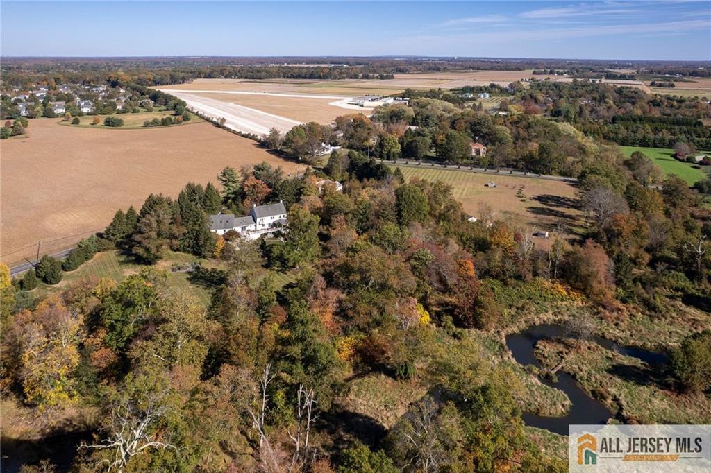 213 Cranbury Neck Road Plainsboro, NJ 08512 - Photo 45 of 52 a view of a city and ocean view