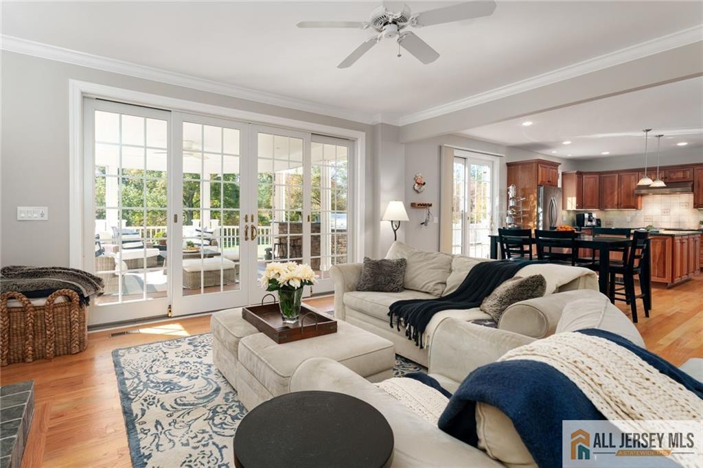 213 Cranbury Neck Road Plainsboro, NJ 08512 - Photo 10 of 52 a living room with furniture and a large window