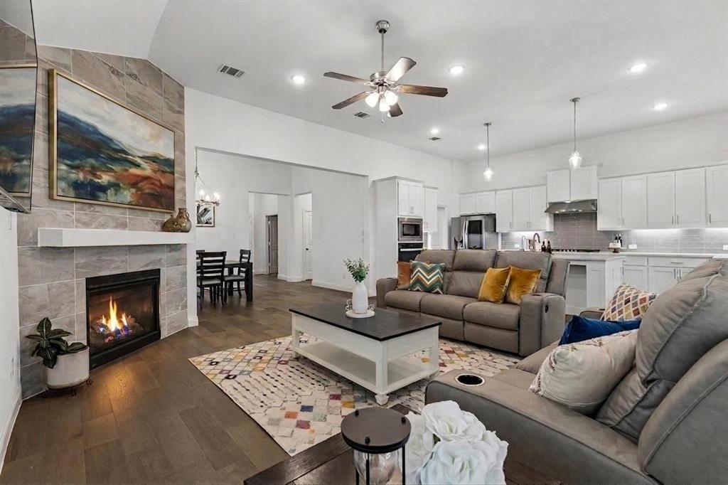 4933 Switchback Street Little Elm, TX 76227 - Photo 8 of 33 So open to the main areas including kitchen and a formal dining or breakfast area.