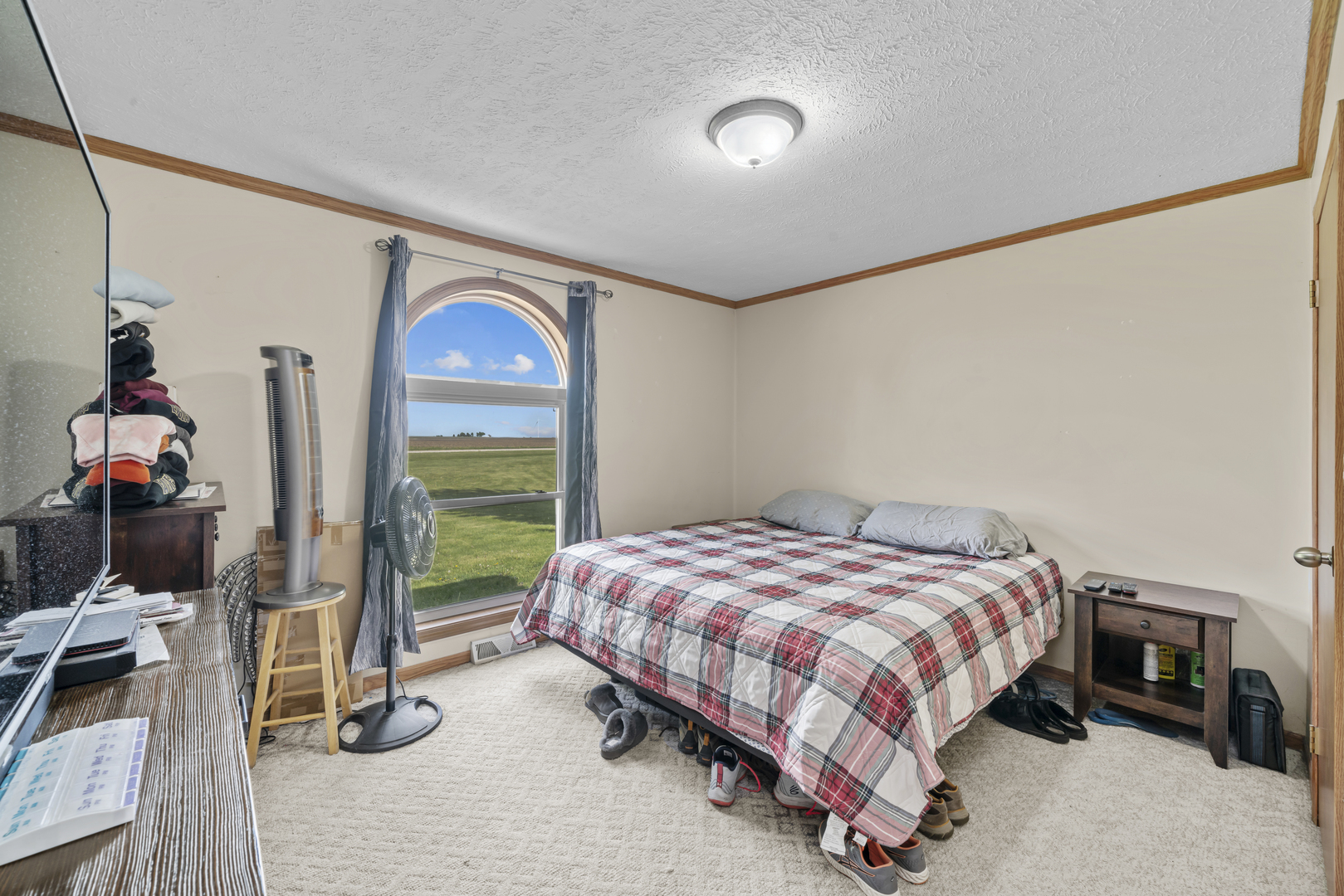 627 German Road Paw Paw, IL 61353 - Photo 16 of 45 a bedroom with a bed and a window