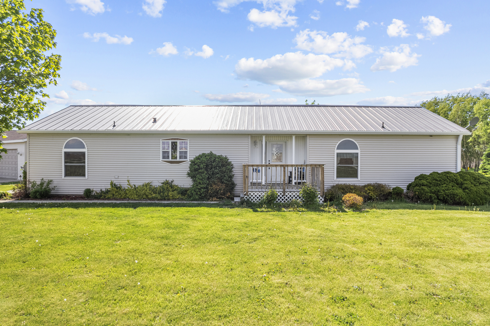 627 German Road Paw Paw, IL 61353 - Photo 2 of 45 a view of a house with swimming pool and a yard