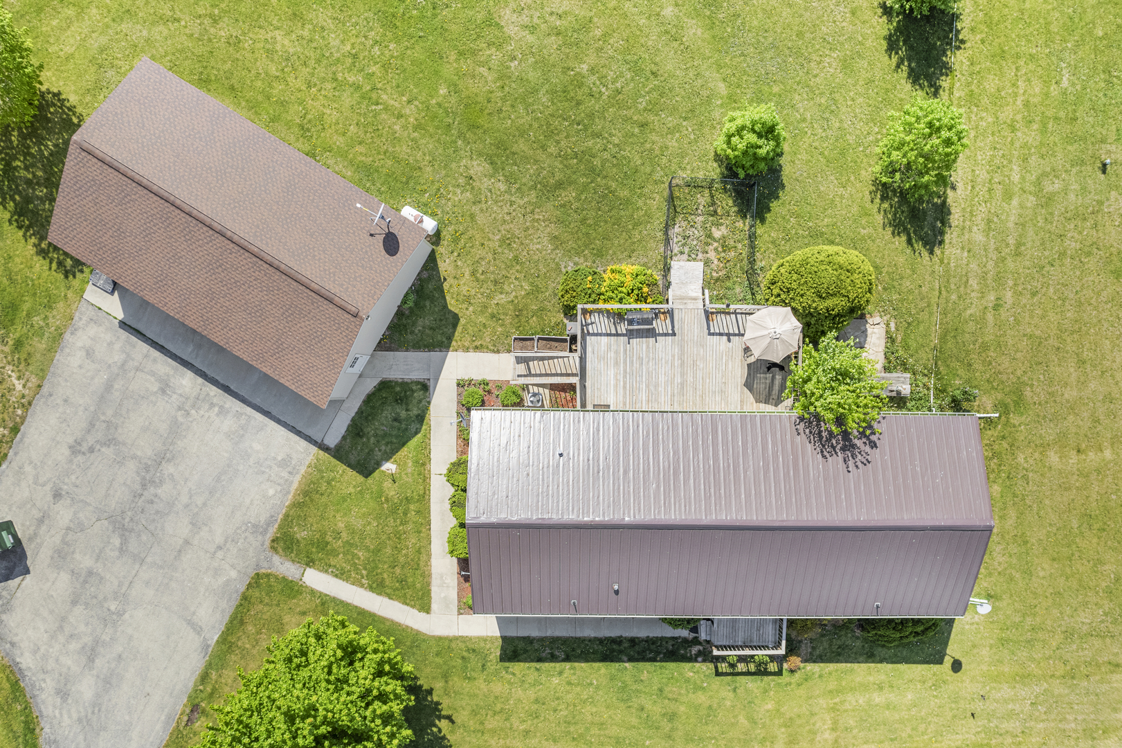 627 German Road Paw Paw, IL 61353 - Photo 3 of 45 an aerial view of a house with a garden and swimming pool