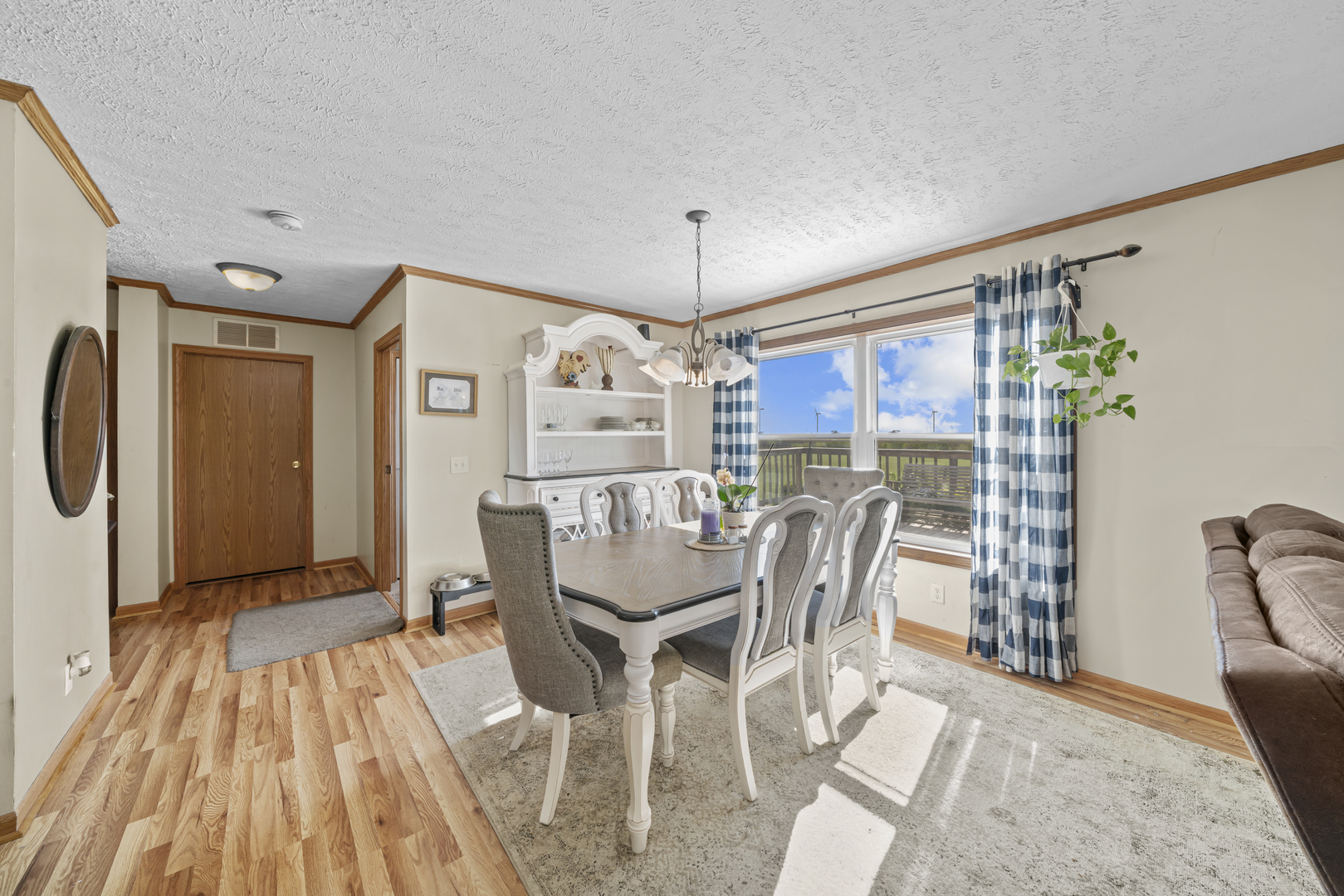 627 German Road Paw Paw, IL 61353 - Photo 9 of 45 a dining room with furniture a chandelier and wooden floor