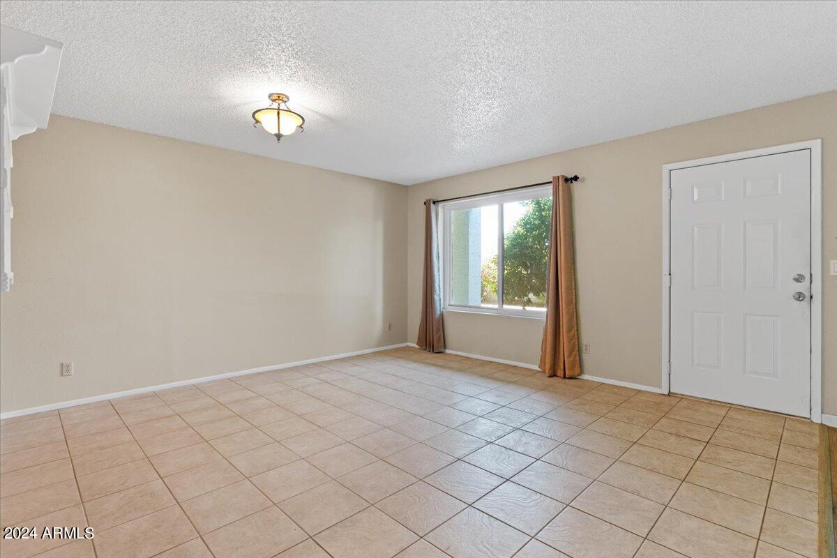 3270 South Goldfield Road, Unit 706 Apache Junction, AZ 85119 - Photo 3 of 32 05-Living Room & Entry