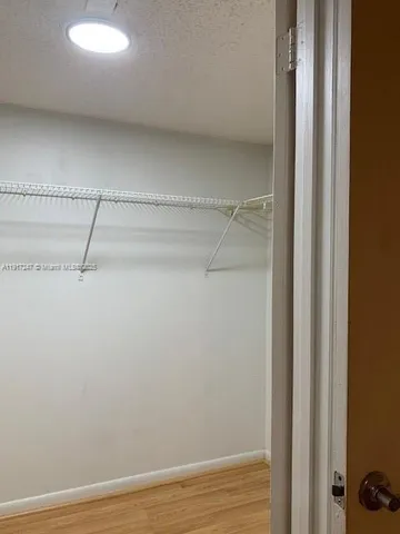 a view of a room with racks on the wall